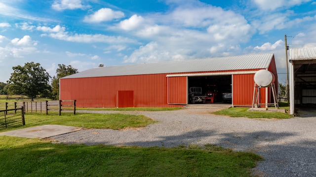 view of outdoor structure with a yard