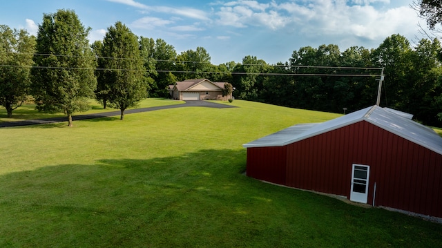 view of yard featuring a garage