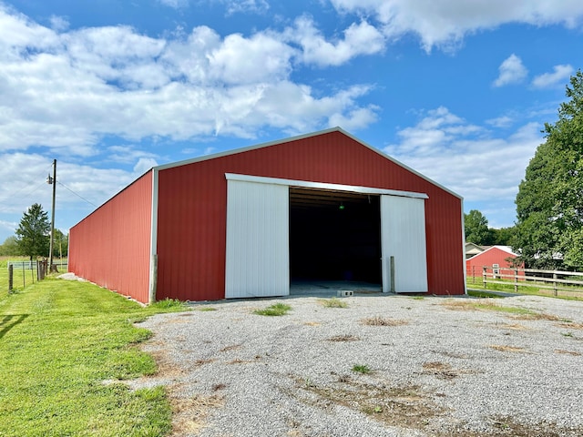 view of outdoor structure featuring a yard