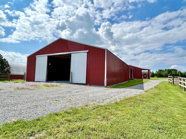 view of outdoor structure with a yard