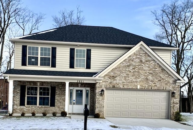 view of front of home featuring a garage