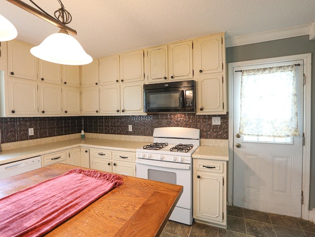 kitchen with white appliances, decorative backsplash, plenty of natural light, and hanging light fixtures