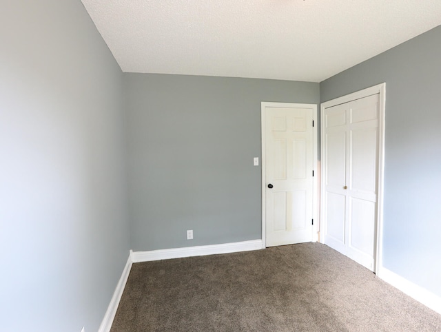 empty room featuring carpet