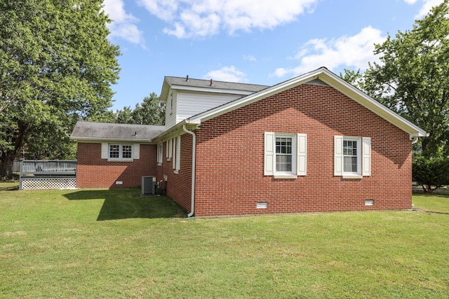 back of house with a lawn, central AC, and a deck