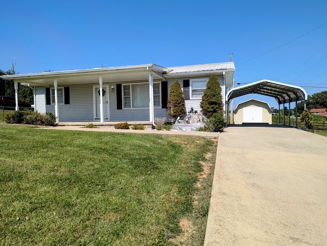 view of front of property with a front yard, covered porch, and a carport