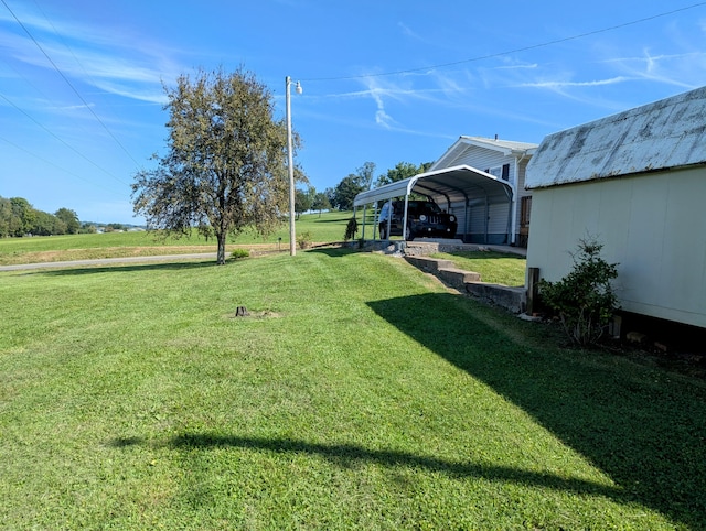 view of yard with a carport