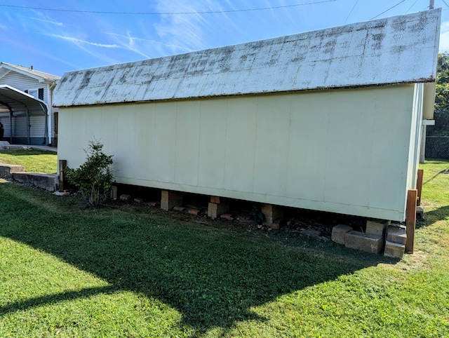 view of home's exterior with a yard