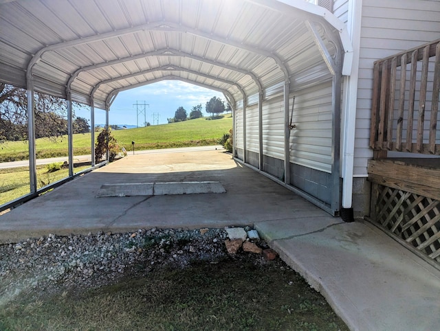 view of parking featuring a lawn and a carport