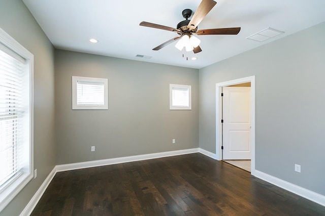 spare room featuring ceiling fan and wood-type flooring