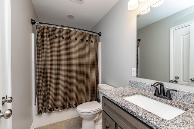 bathroom featuring toilet, shower / bath combination with curtain, and vanity