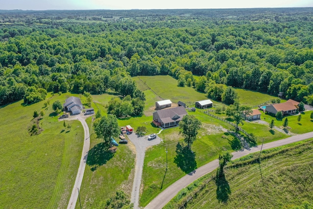 aerial view featuring a wooded view