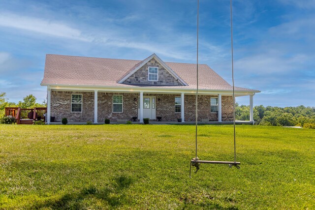 view of front facade with a front lawn