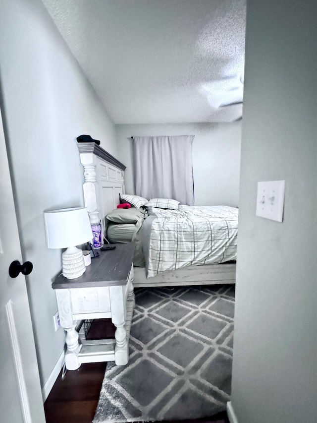 231 Hatfield St, Corbin, KY 40701 - bedroom with a textured ceiling and baseboards