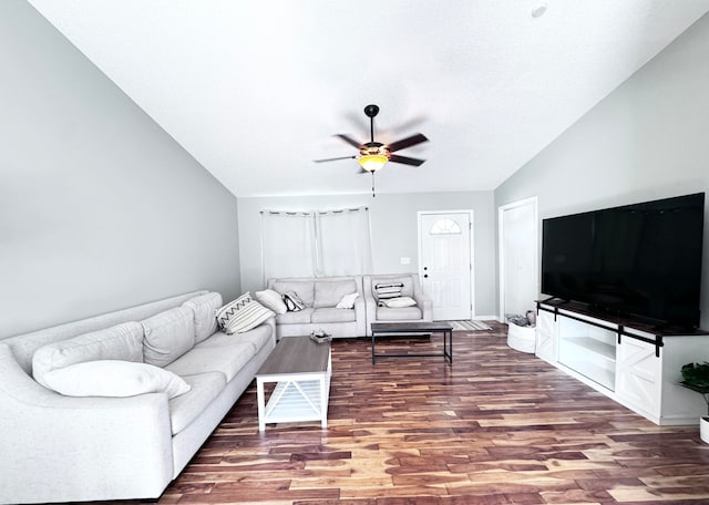 living room with hardwood / wood-style floors, ceiling fan, and lofted ceiling