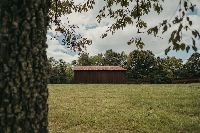 8594 Morehead Rd, Flemingsburg, KY 41041 - view of yard featuring an outbuilding, an outdoor structure, and fence