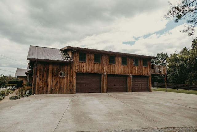 8594 Morehead Rd, Flemingsburg, KY 41041 - rustic home featuring metal roof and concrete driveway