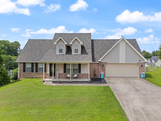 view of front of house with a garage and a front yard