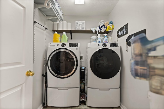 washroom with washer and clothes dryer