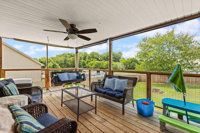 exterior space featuring ceiling fan