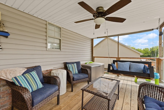 sunroom / solarium with ceiling fan