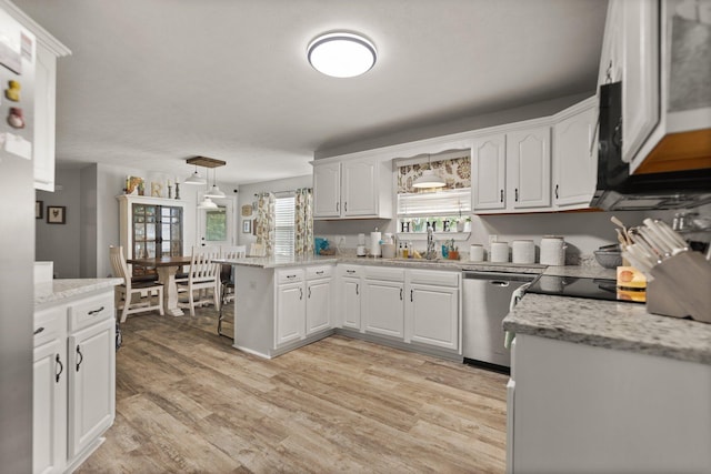 kitchen with light stone countertops, light hardwood / wood-style floors, dishwasher, white cabinetry, and hanging light fixtures