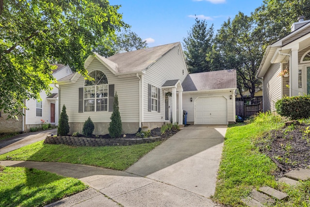 view of front of house featuring a garage and a front yard