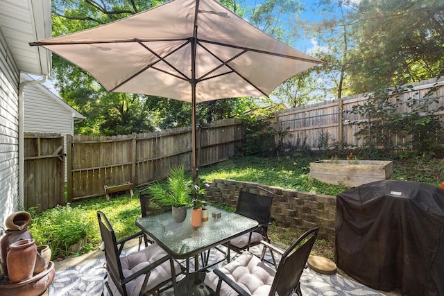 view of patio / terrace featuring a grill