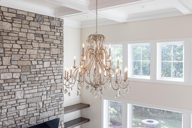 interior details featuring crown molding, coffered ceiling, beam ceiling, and an inviting chandelier