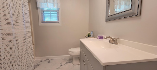 full bath with baseboards, toilet, a shower with curtain, marble finish floor, and vanity