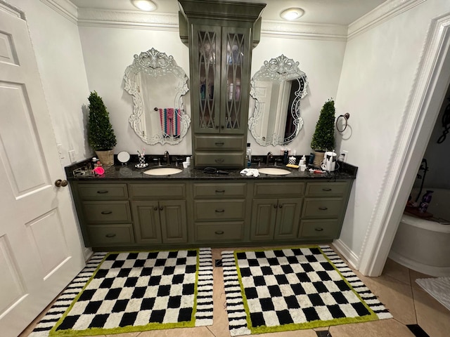 bathroom featuring tile patterned flooring, crown molding, and vanity