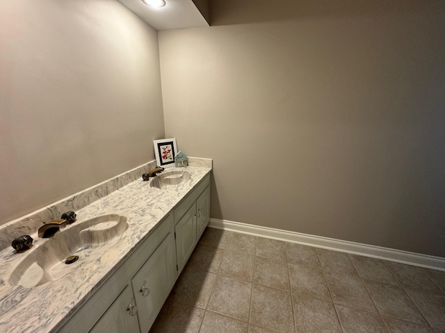 bathroom with vanity and tile patterned floors