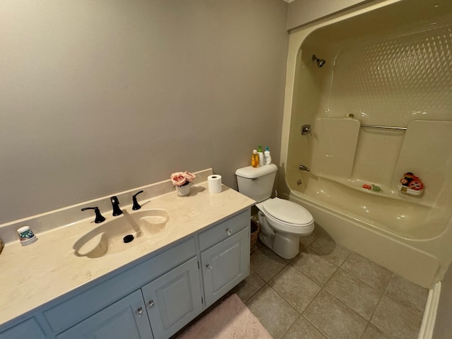 full bathroom with tile patterned flooring, toilet, vanity, and shower / washtub combination