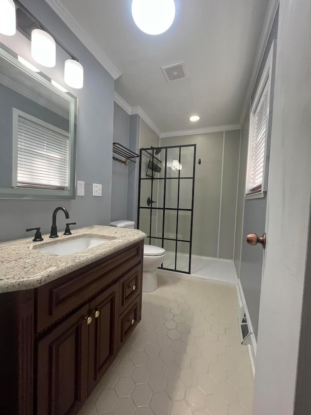 bathroom with tile patterned flooring, crown molding, walk in shower, toilet, and vanity