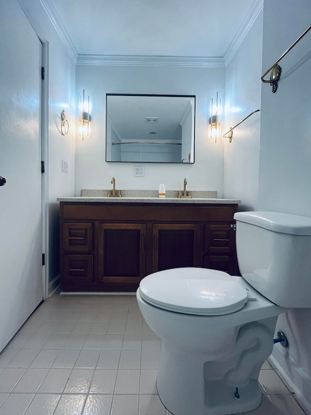 bathroom featuring tile patterned flooring, vanity, toilet, and ornamental molding