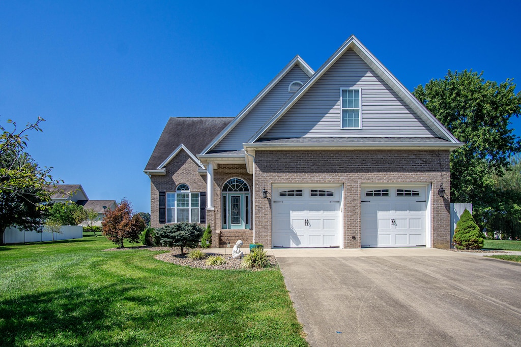 view of front of home with a front lawn