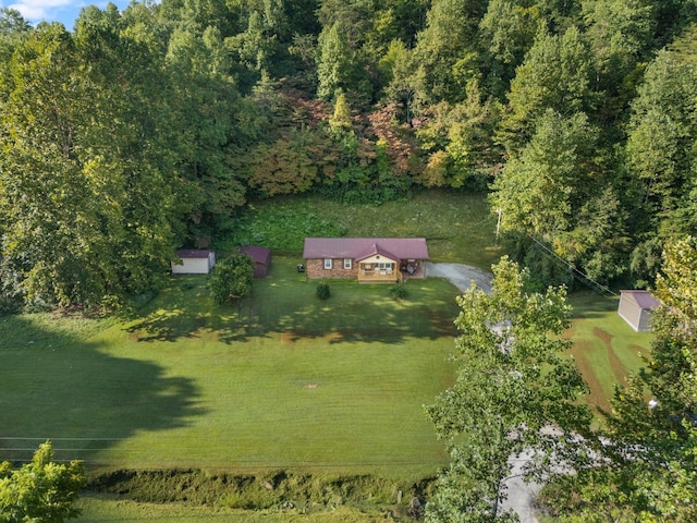 birds eye view of property featuring a rural view