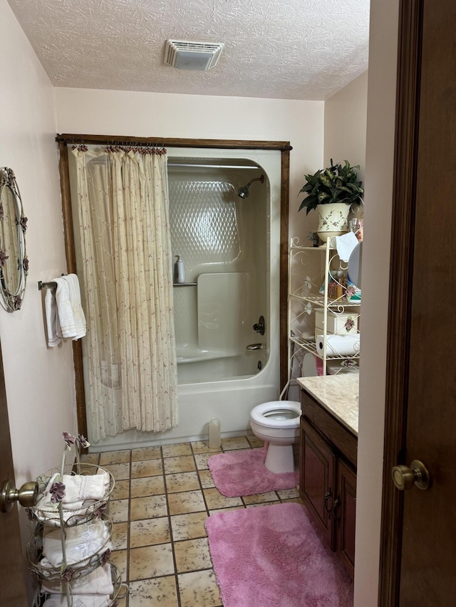 bathroom with a textured ceiling, toilet, vanity, visible vents, and shower / bathing tub combination