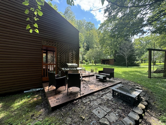 view of yard featuring a fire pit