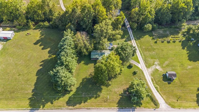 birds eye view of property featuring a rural view