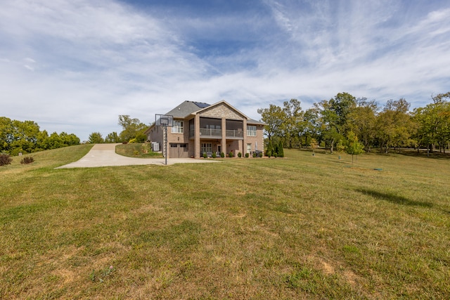 rear view of house with a yard