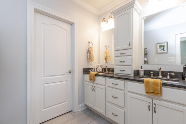 bathroom featuring crown molding, vanity, and tile patterned flooring