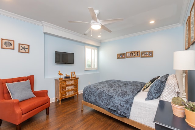 bedroom with ceiling fan, dark hardwood / wood-style floors, and crown molding