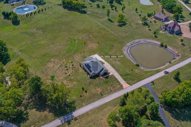 aerial view featuring a water view and a rural view