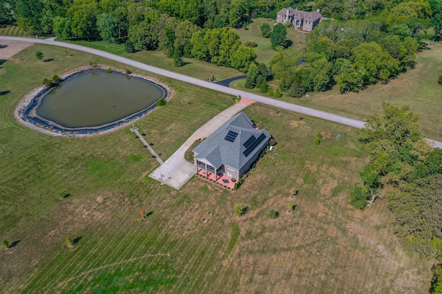 bird's eye view featuring a water view and a rural view