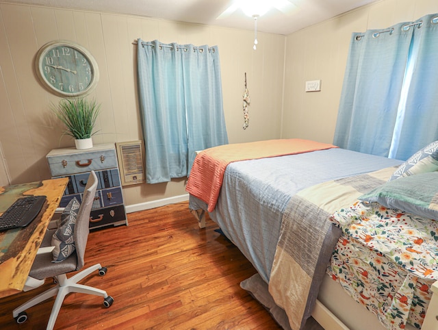 bedroom featuring hardwood / wood-style floors