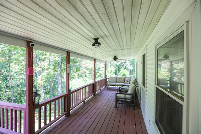 wooden deck with ceiling fan