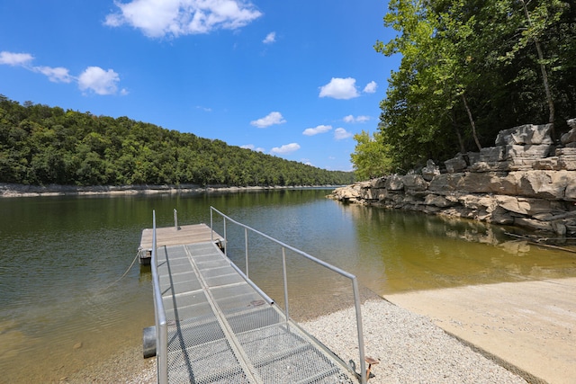 view of dock with a water view