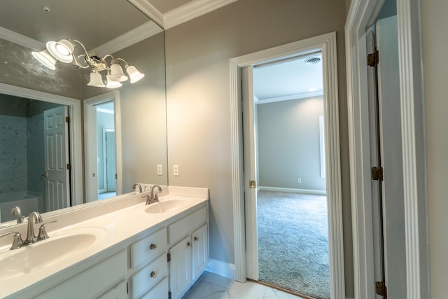 bathroom featuring a bath, crown molding, and vanity