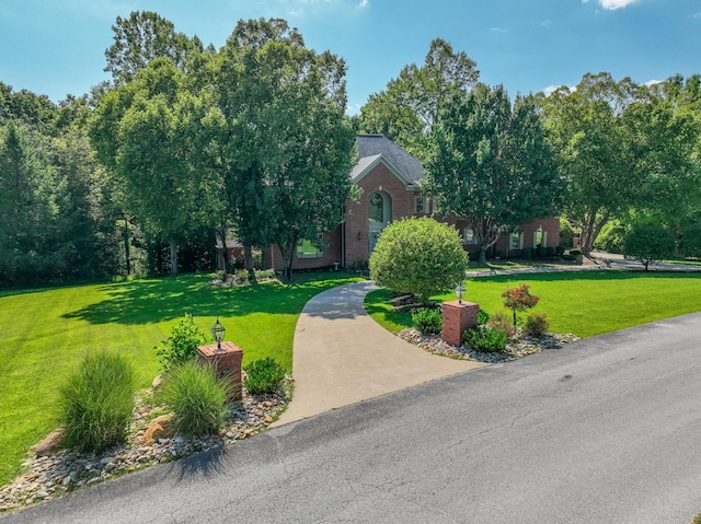 view of front of home with a front yard