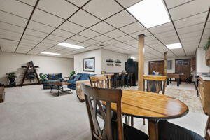 dining space featuring a drop ceiling